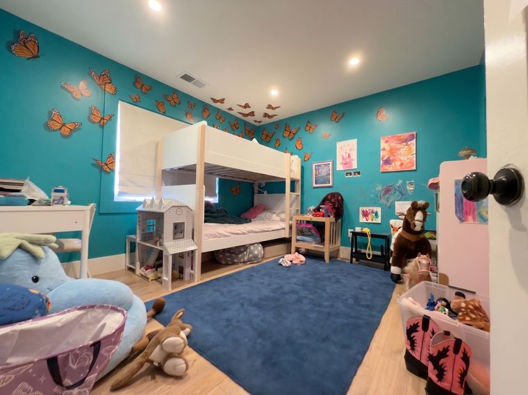 Turquoise walls, orange butterflies