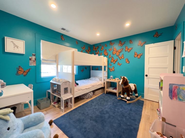Turquoise walls, orange butterflies