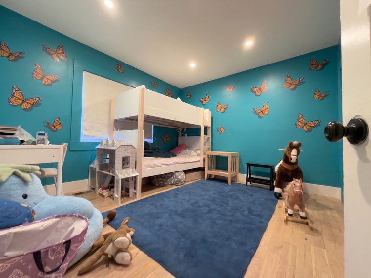 Turquoise walls, orange butterflies