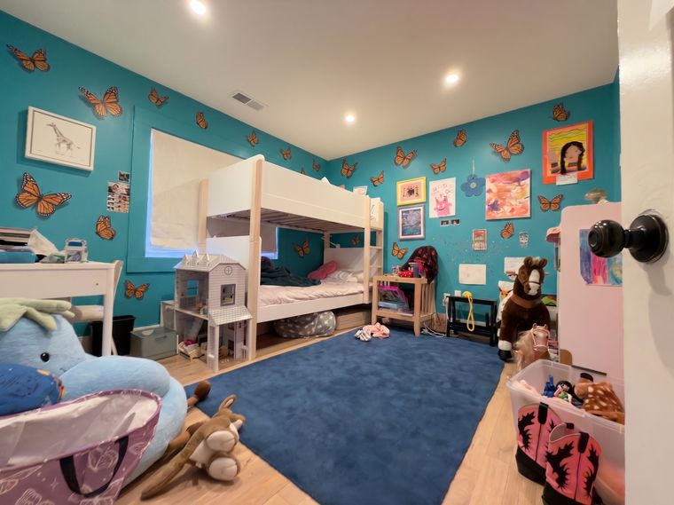 Turquoise walls, orange butterflies