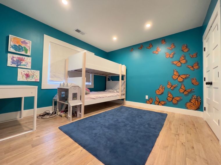 Turquoise walls, orange butterflies