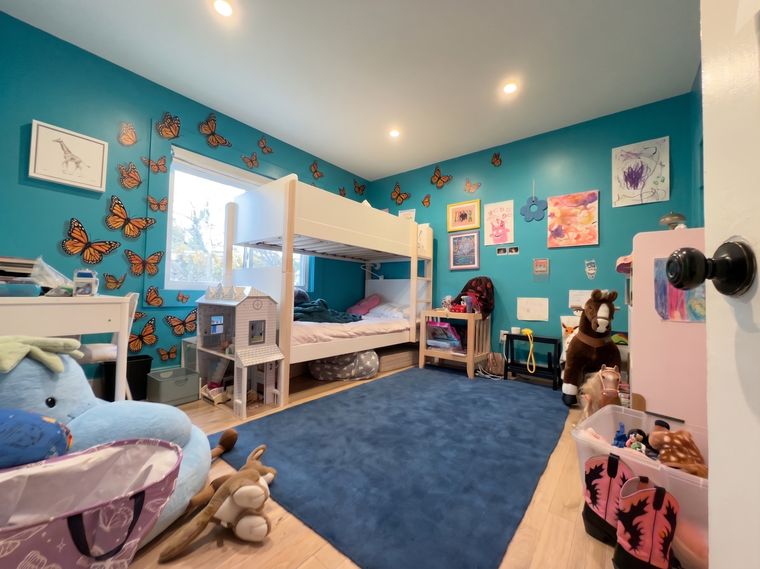Turquoise walls, orange butterflies