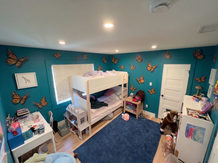 Turquoise walls, orange butterflies