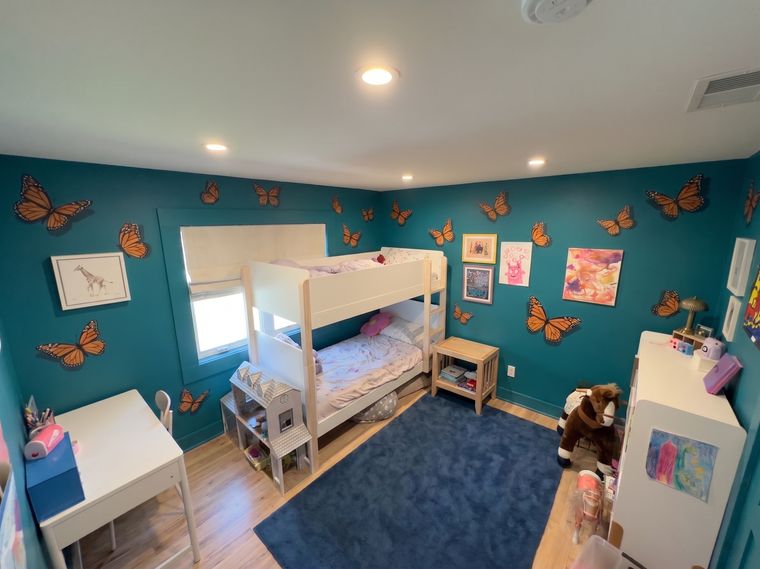 Turquoise walls, orange butterflies