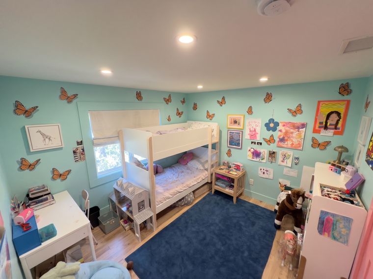 Turquoise walls, orange butterflies