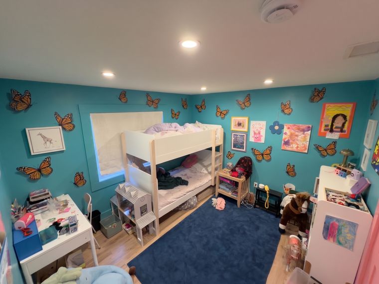 Turquoise walls, orange butterflies